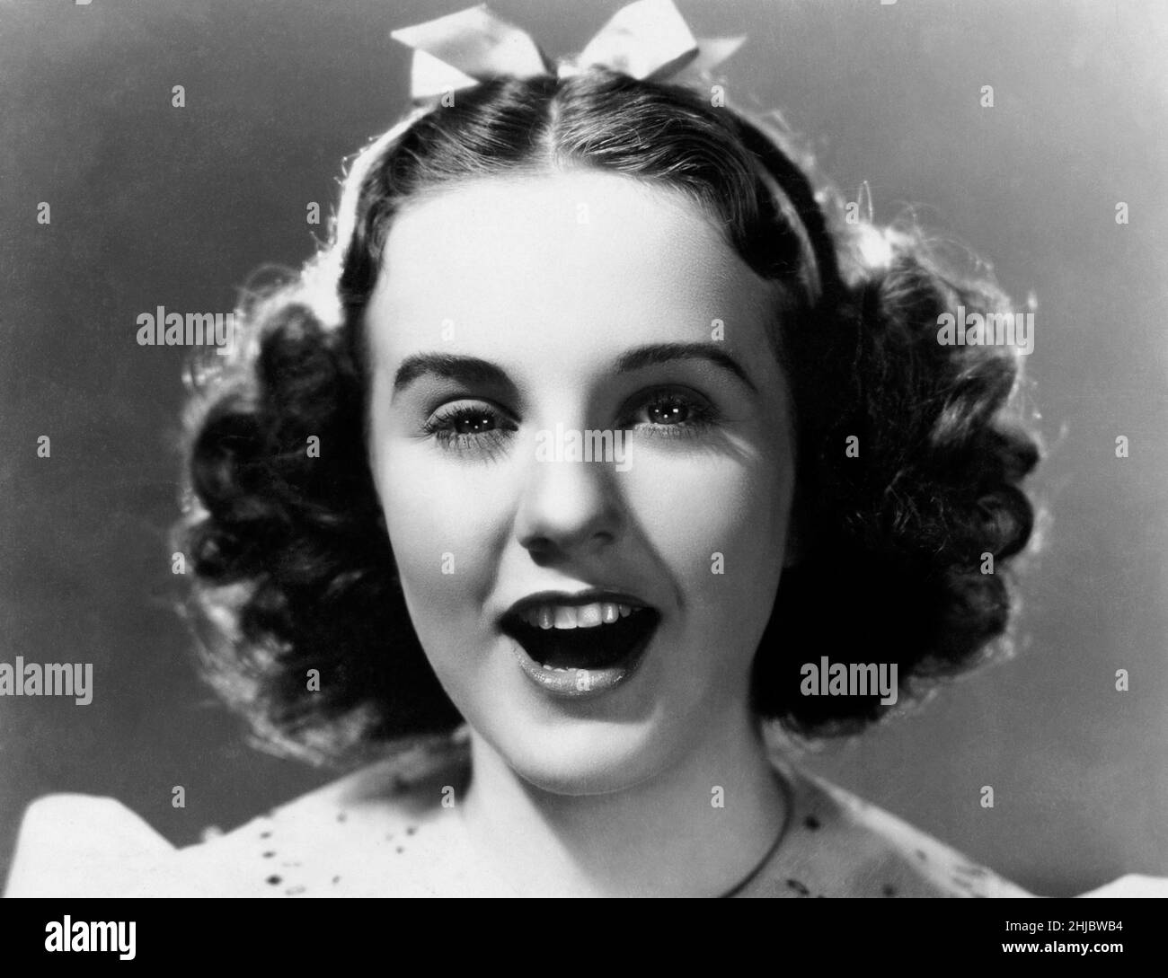 Deanna Durbin Portrait for 'One Hundred Men and a Girl' USA, 1937 Director: Henry Koster Stock Photo
