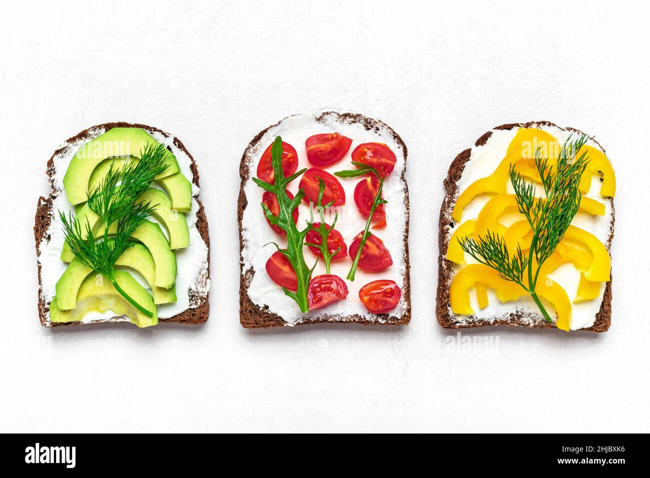 Variety of sandwiches for breakfast slice of whole grain dark bread