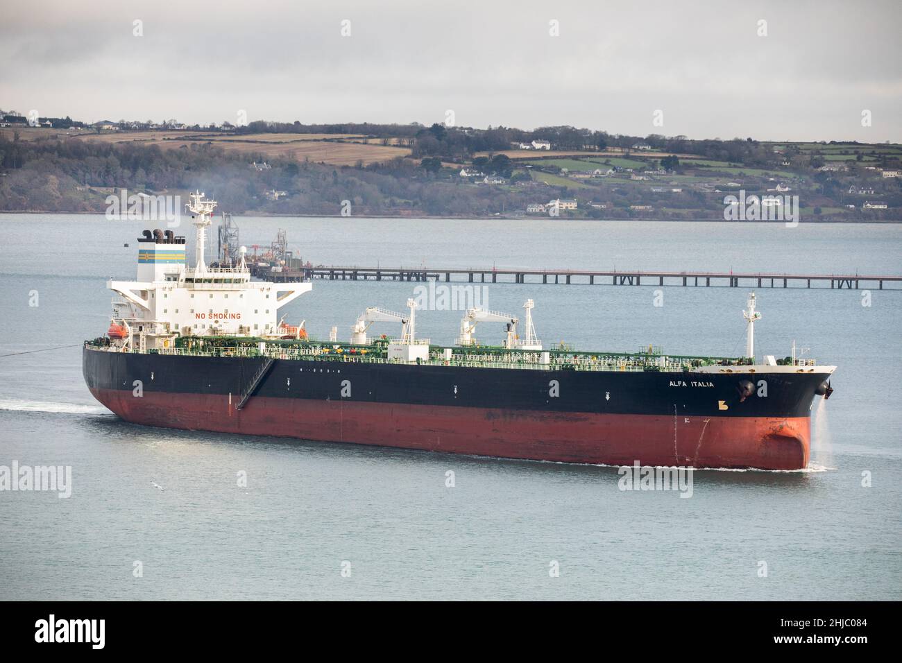Whitegate, Cork, Ireland. 28th January, 2022.Tanker Alfa Italia departs the harbour after discharging her cargo of crude oil at Whitegate, Co. Cork, Ireland. - Credit; David Creedon / Alamy Live News Stock Photo