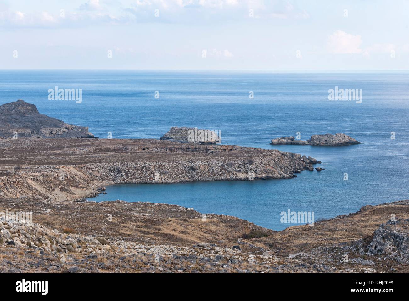 Landscape of a barren land meeting the sea Stock Photo