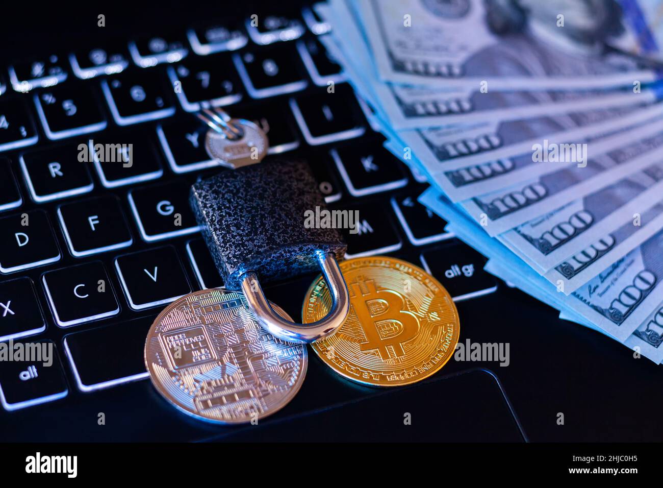 100 dollar bills gold key hi-res stock photography and images - Alamy