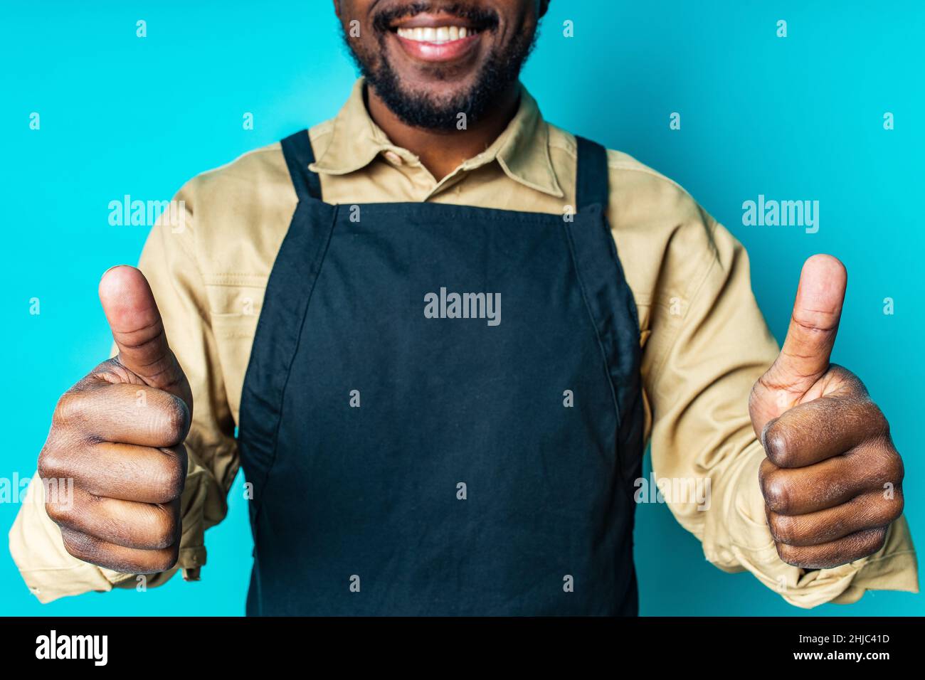 Black apron hi-res stock photography and images - Alamy