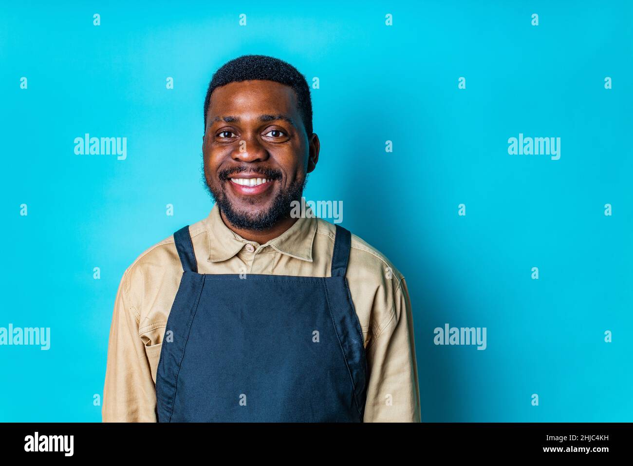 Black apron hi-res stock photography and images - Alamy