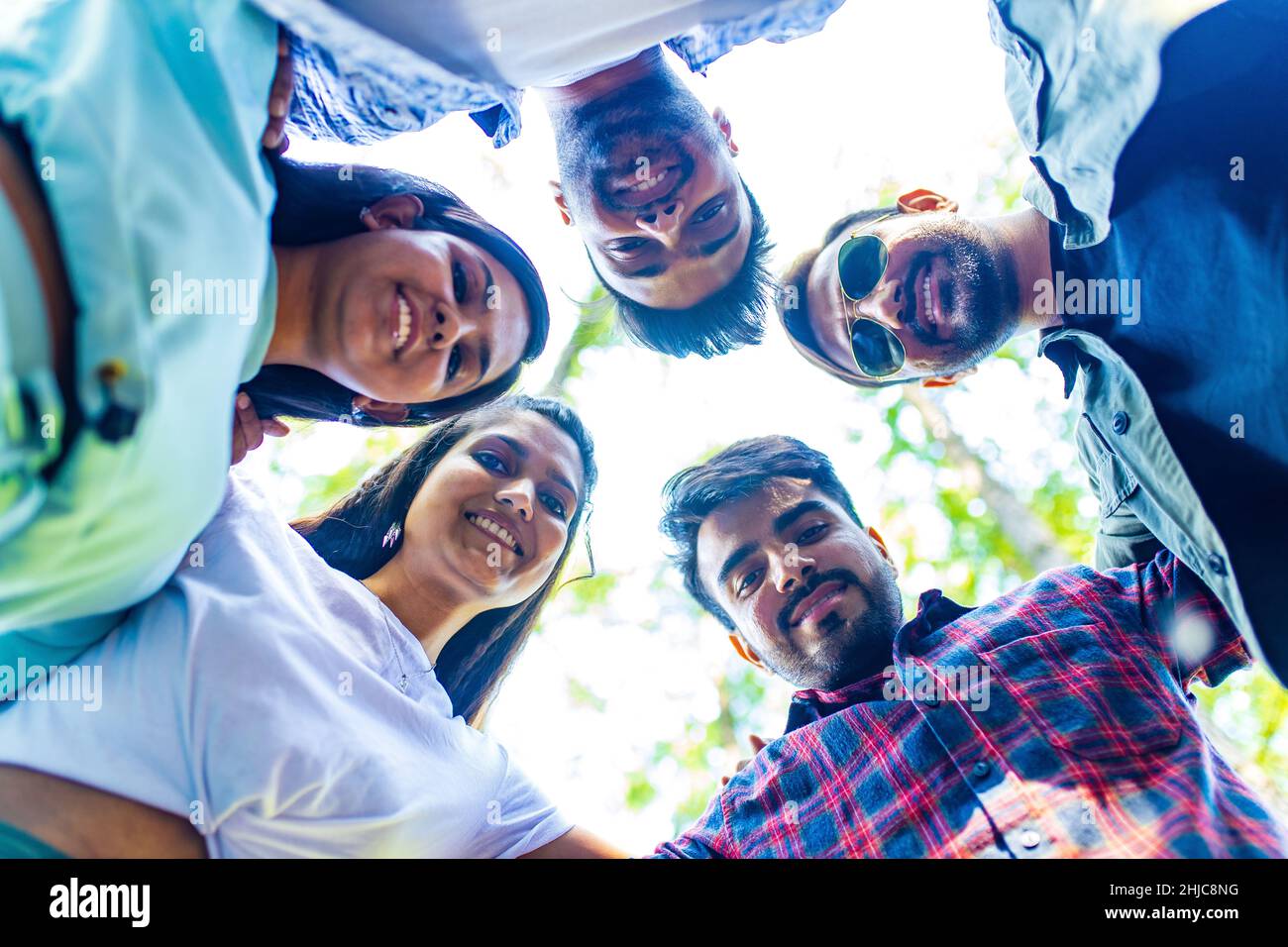 Group of friends having fun together making a self portrait with happy faces Stock Photo