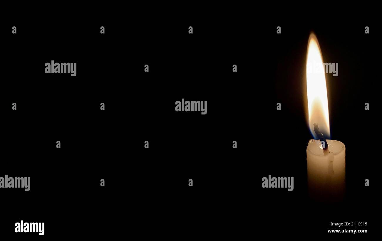 Candle light with dark background. Candle light concept Stock Photo - Alamy