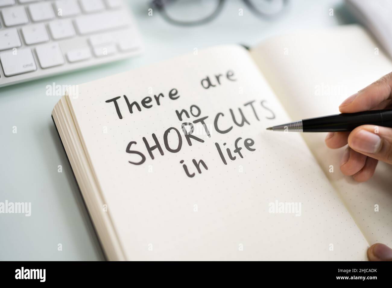 No Shortcut Text Written By Person With Marker On Page Stock Photo