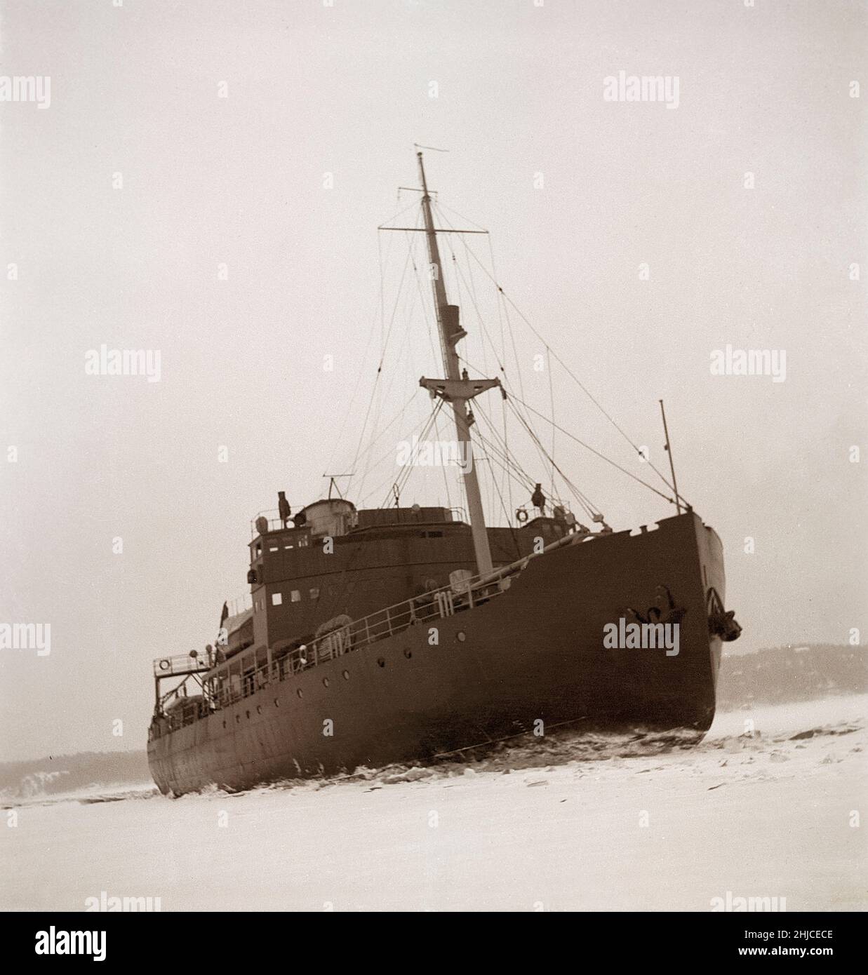 Winter at sea in the 1940s. Pictured the swedish icebreaker Ymer breaking the ice in the inner waters at the swedish coast in febrary 1941. The icebreaker Ymer was built in Malmö 1931-1933 and served as a state icebreaker for 44 years until she was sold and scrapped 1976. The winters during the World war II was often exceptionally cold and the ice became a big problem for the shipping industry and for the military.  Sweden 1942 Kristoffersson ref 172-6 Stock Photo