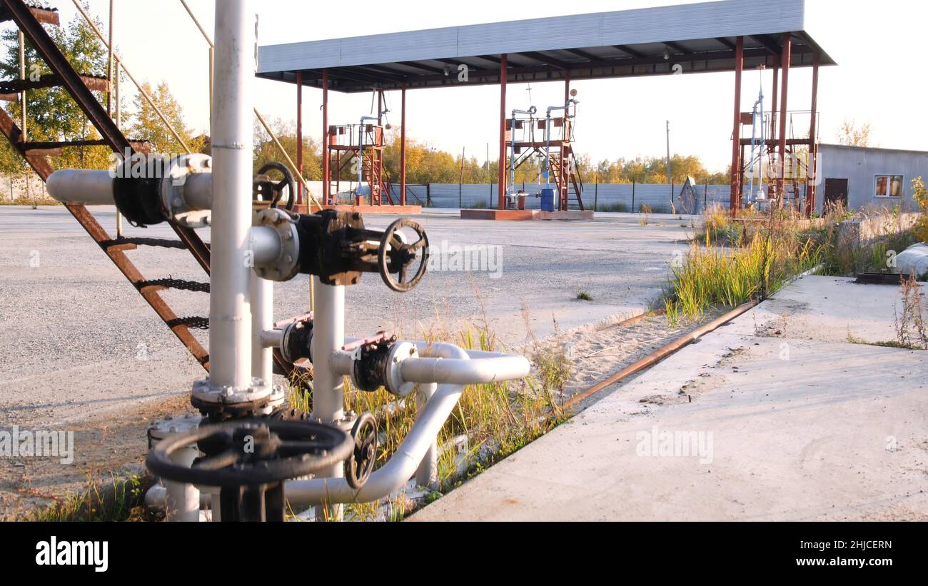 Fuel tanks on a prairie farm yard. Stock. Old tank farm. Fuel industry