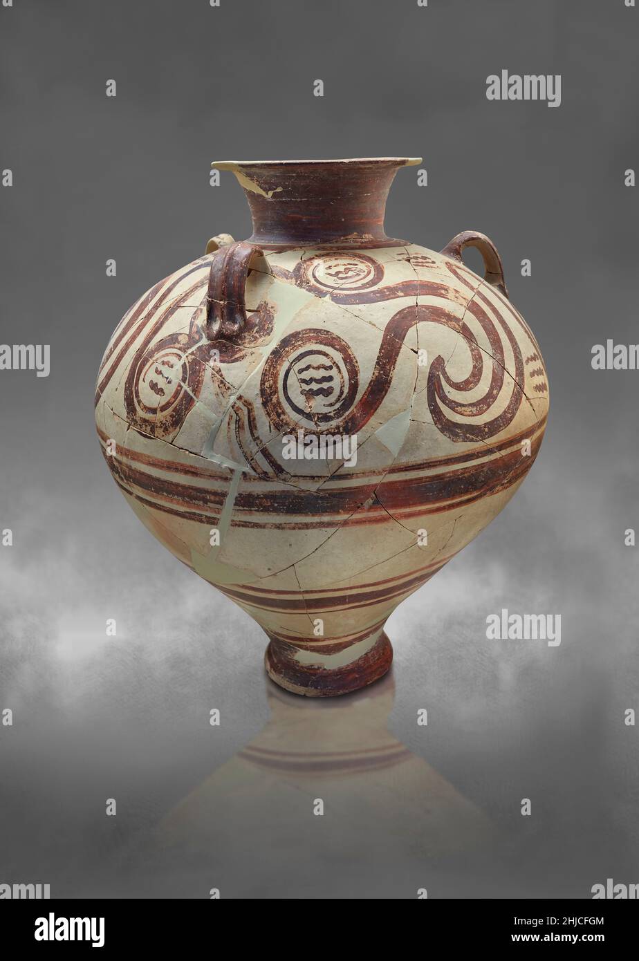 Mycenaean pottery . Piriform Jar with repeated swirl design, 1500-1450 BC, Mycenaean cemetery of Dendra. Nafplio Archaeological Museum. . Against grey Stock Photo