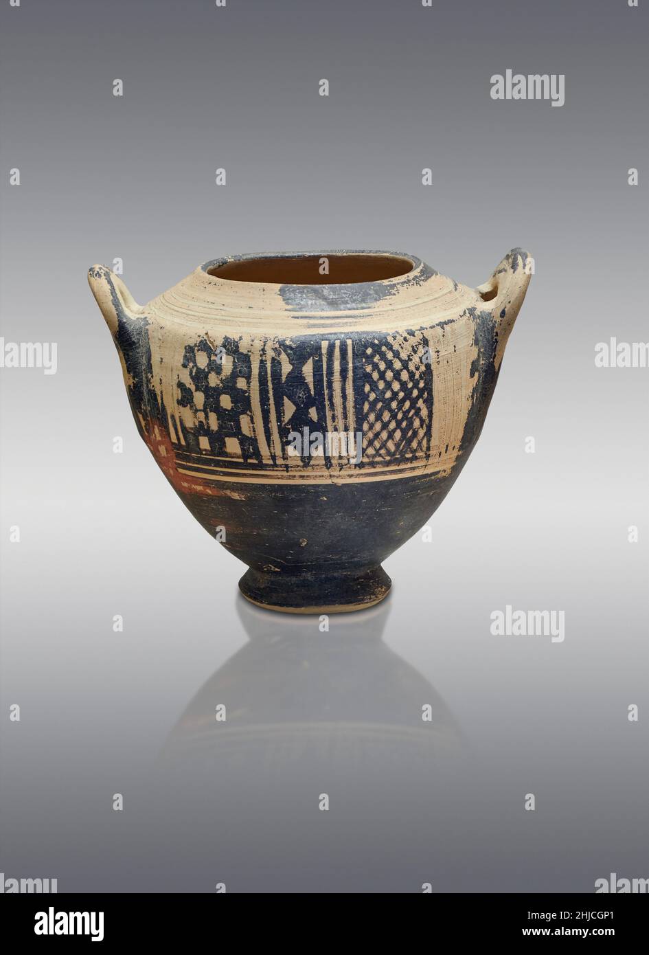 Mycenaean pottery - Terracotta Pyxis  with geometric designs, Tiryns grave 1974.11, 1025-900 BC. Nafplion Archaeological Museum.  Against grey backgro Stock Photo