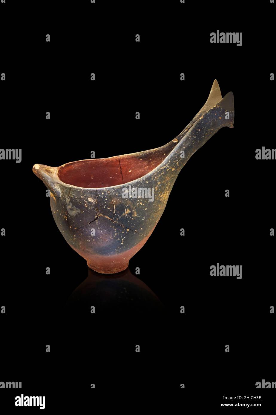 Neolithic Greek pottery sauceboat, Tiryns Lower Citadel, 2700-2200 BC . Nafplion Archaeological Museum. Black background. Photographer Paul E Williams Stock Photo