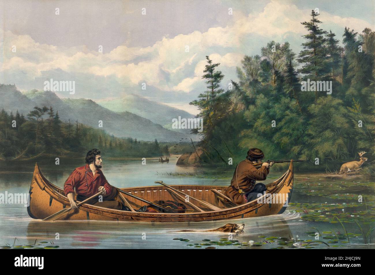 A scene of frontier-era Americans deer hunting from a canoe. 'A good Chance' painted by Arthur Fitzwilliam Tait; lithograph by Currier & Ives, 1863. Stock Photo