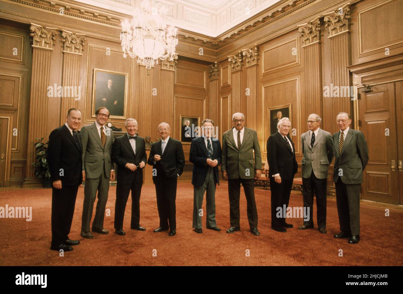 US Supreme Court Justices in 1977, from left to right: Potter Stewart, William Rehnquist, John Paul Stevens, William J. Brennan, Harry Blackmun, Thurgood Marshall, Chief Justice Warren E. Burger, Byron White, Lewis F. Powell. Stock Photo