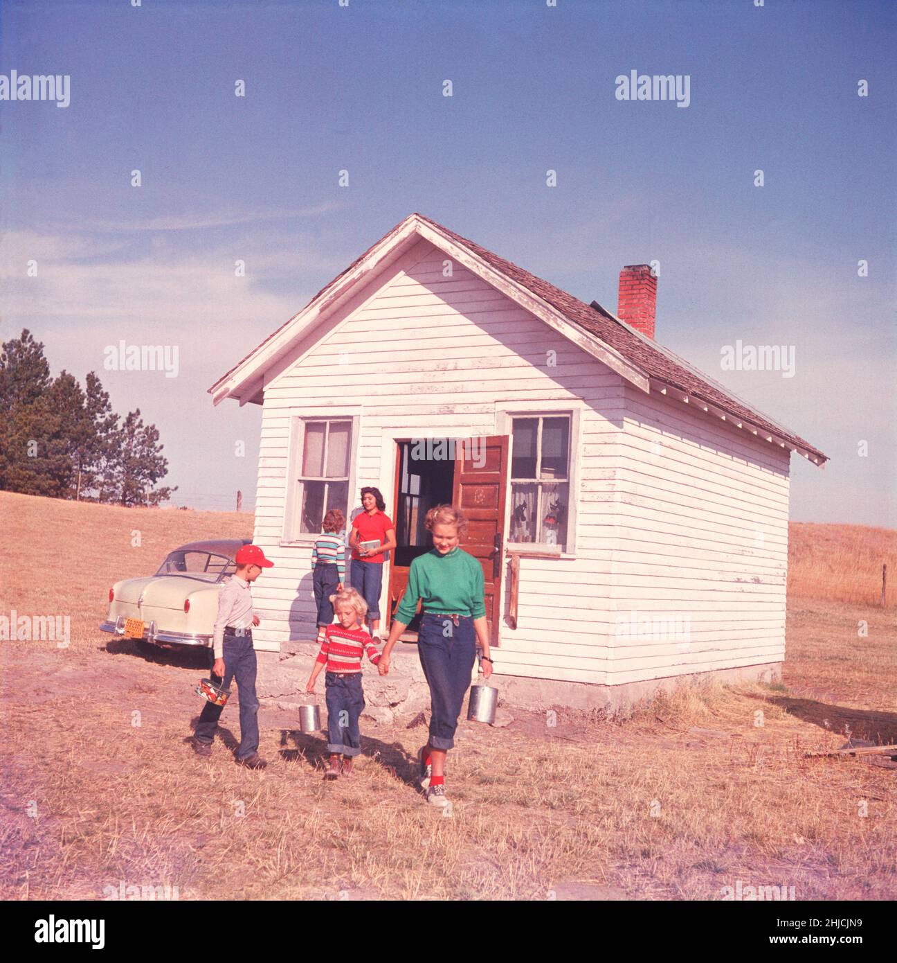 A little one-room schoolhouse at Pine Top had 8 pupils. At the time the photograph was taken (1955), Nebraska had more of these 'one-roomers' than any other state. Stock Photo