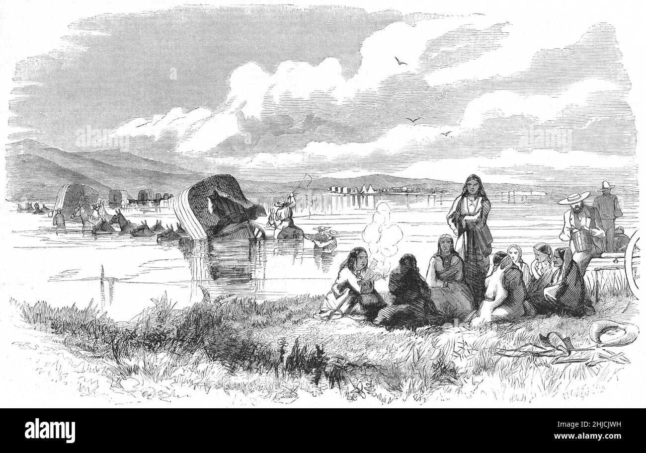 A wagon train crossing the Platte River during the Colorado Gold Rush, with Native American woman sitting on the riverbank. Illustration by Albert Bierstadt (1830-1902). Harper's Weekly, August 13, 1859. The Pike's Peak Gold Rush, later known as the Colorado Gold Rush, occurred in Kansas Territory and Nebraska Territory from mid-1858 to early-1861. Stock Photo