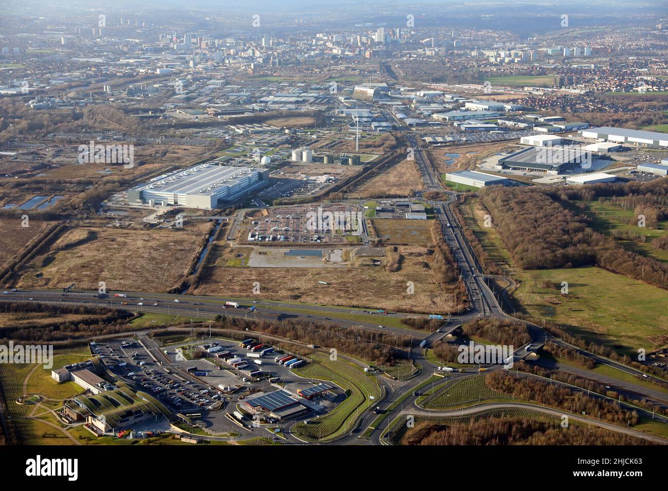 aerial view looking west from J45 of the M1 motorway looking down tha A63 Pontefract Lane towards Leeds city centre (Temple Green Park & Ride in shot) Stock Photo