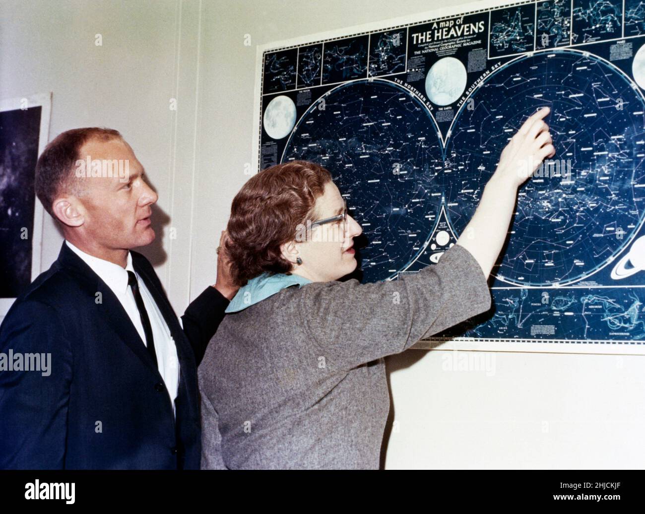Dr. Nancy Grace Roman, NASA's first Chief of Astronomy, briefs Astronaut Edwin 'Buzz' Aldrin on celestial objects in 1965 in Washington, D.C. Stock Photo
