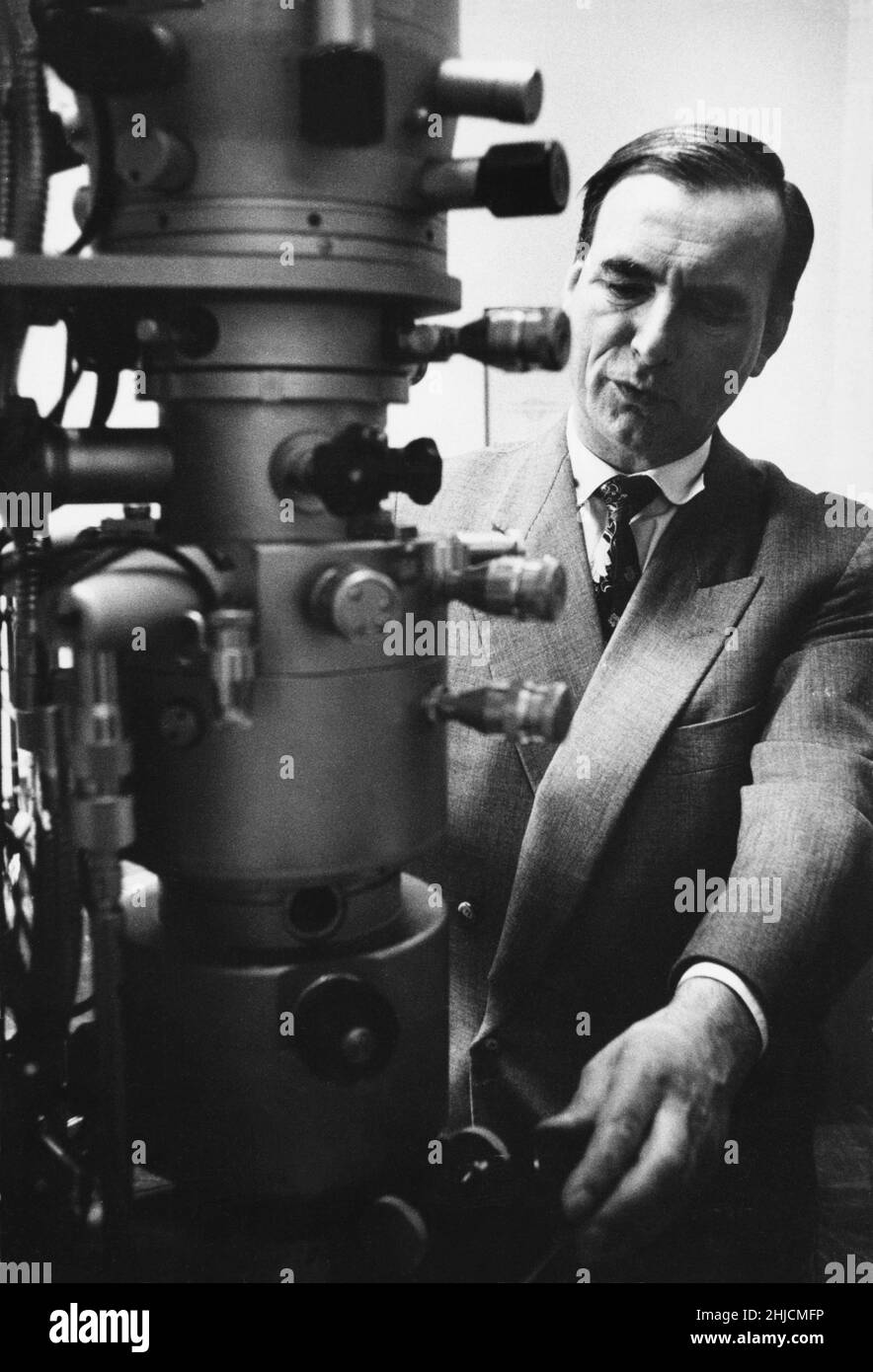 Professor Ernst Ruska (1906-1988) was a German physicist who built an electron lens, which he used in constructing the first electron microscope. Photographed here at the Max Plank Institute for Physics in Berlin. Stock Photo