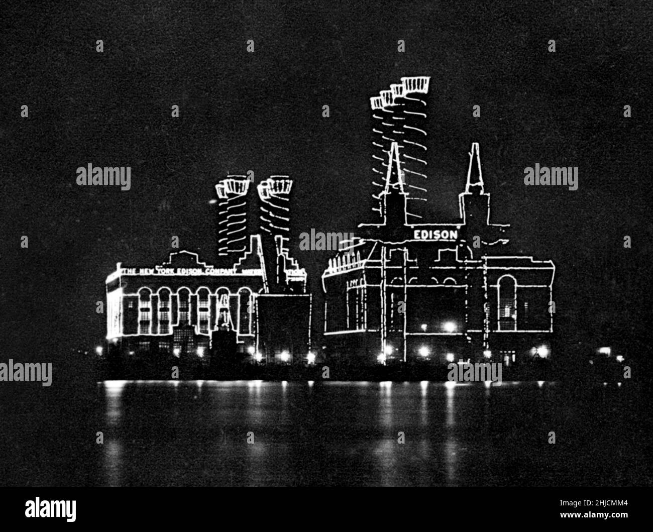 A half-sterograph view of the Edison power plant on East 35th Street in New York City lit up for the Hudson-Fulton celebration. Stereo-Travel Co., 1909. Stock Photo