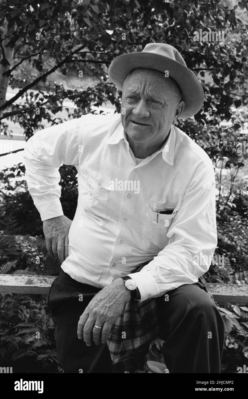 Former Supreme Court judge William O. Douglas, photographed waiting for a friend to take a walk along the Georgetown Canal; undated. Stock Photo