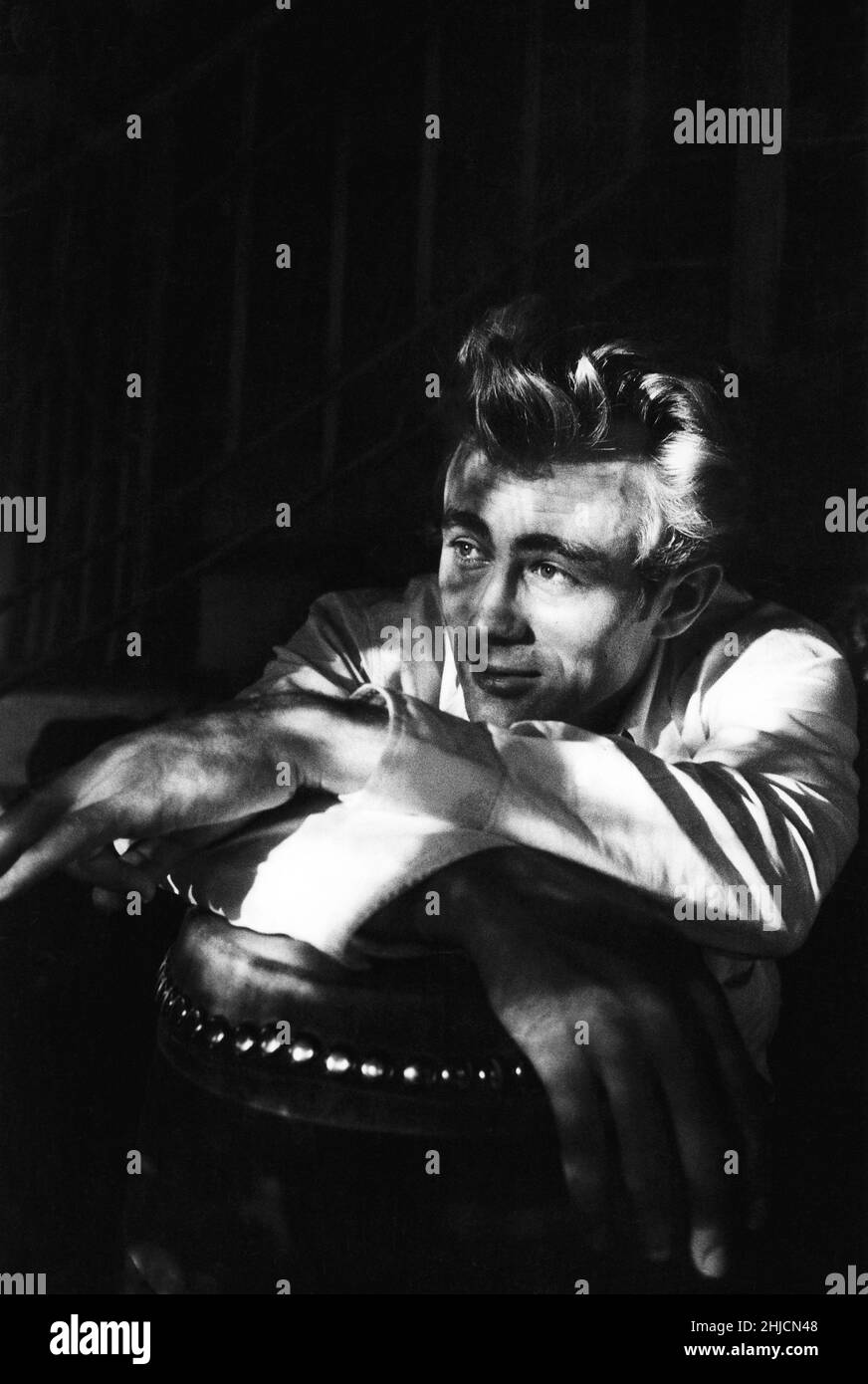 James Dean, actor, was born in Marion, Indiana, on February 8, 1931. His fame is based on three movies, East of Eden, Rebel Without a Cause and Giant. With the success and earnings of East of Eden he purchased a Porsche (one of two) which he raced in between shoots. After finishing his work on Giant he headed out for an important race in his Porsche Spyder 550 and at the intersection of Routes 46 and 41 near Cholame he collided with another car instantly dying on September 30, 1955 at the age of 24. Stock Photo