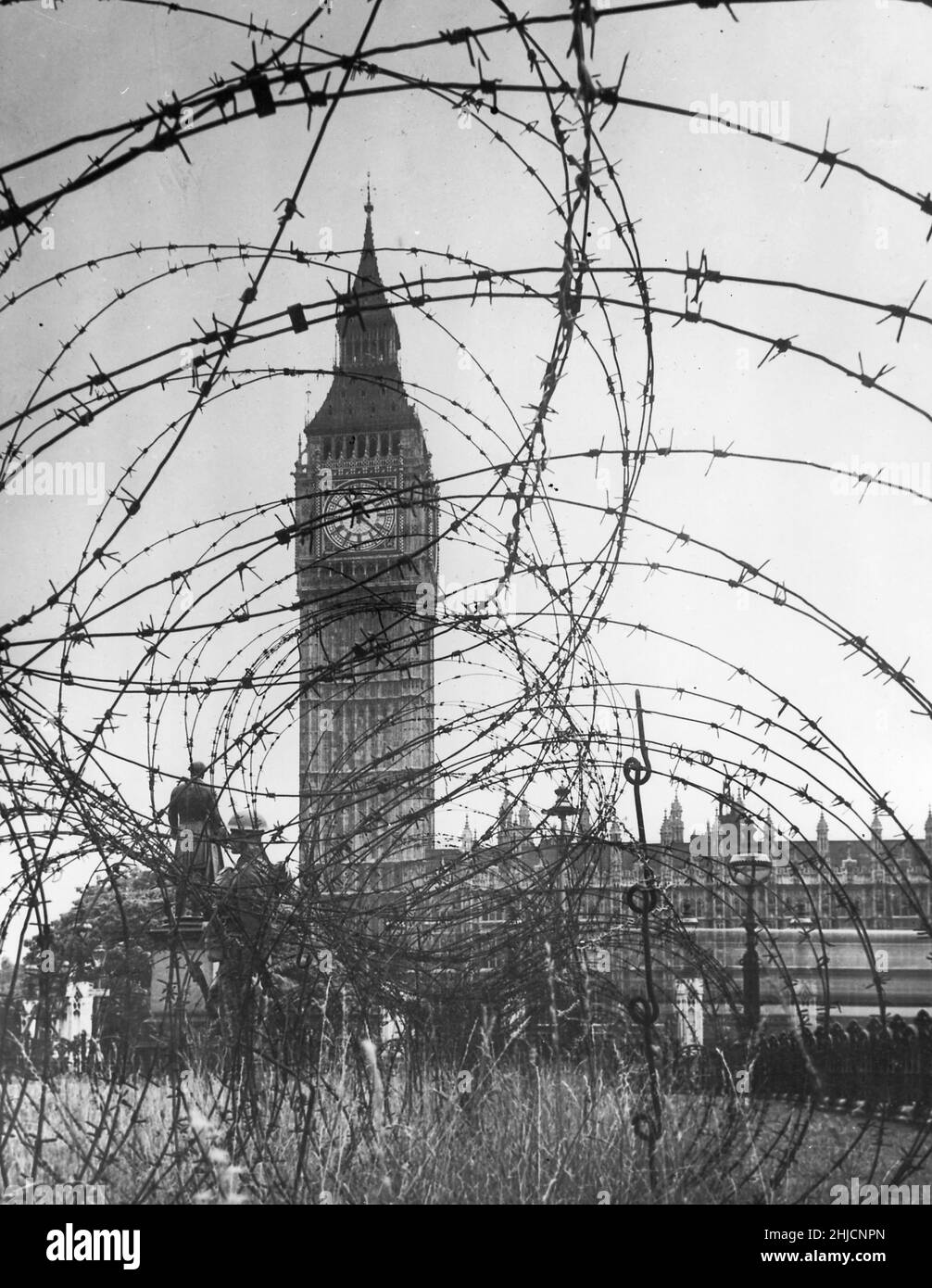 Big Ben and the Houses of Parliament through barbed war, London, World War 2. Stock Photo