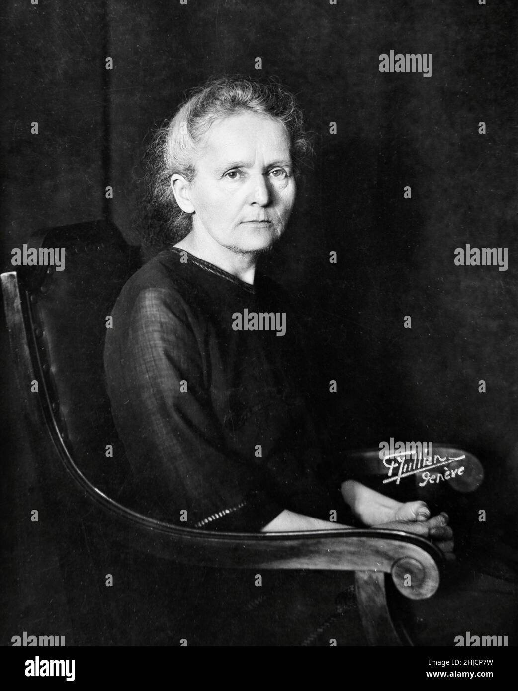 Marie Curie (1867-1934) was a Polish-French physicist and chemist and multiple Nobel laureate. Her achievements included a theory of radioactivity (a term that she coined), techniques for isolating radioactive isotopes, and the discovery of two elements, polonium and radium. Photographed by Frank Henri Jullien, 1922. Stock Photo