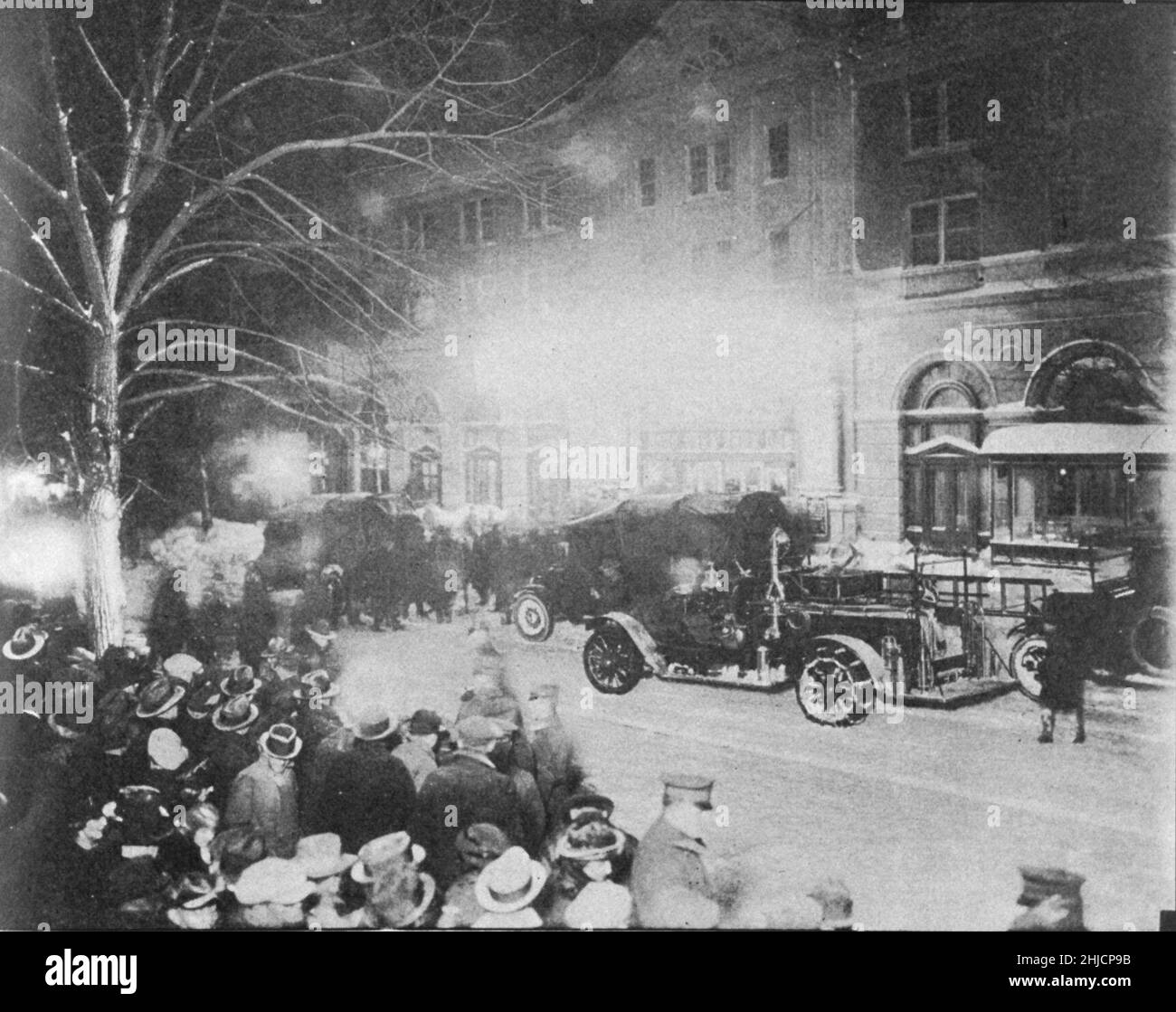 In front of the Knickerbocker Theater immediately after it collapsed. Handwritten note below indicates that it was probably the following night. 96 were killed and 125 injured in the collapse of the theater. One other man froze to death in the storm. Washington, D. C. January 27, 28, 1922. Stock Photo
