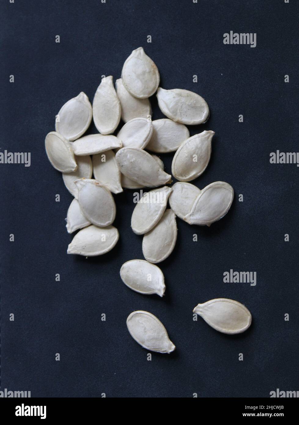 Dried Pumpkin Seeds on a Dark Background Stock Photo Alamy