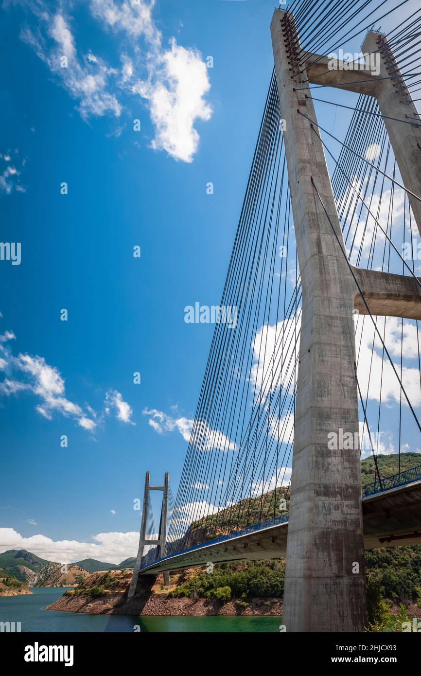 Cable-stayed bridge over the Barrios de Luna reservoir in Spain on a sunny day Stock Photo