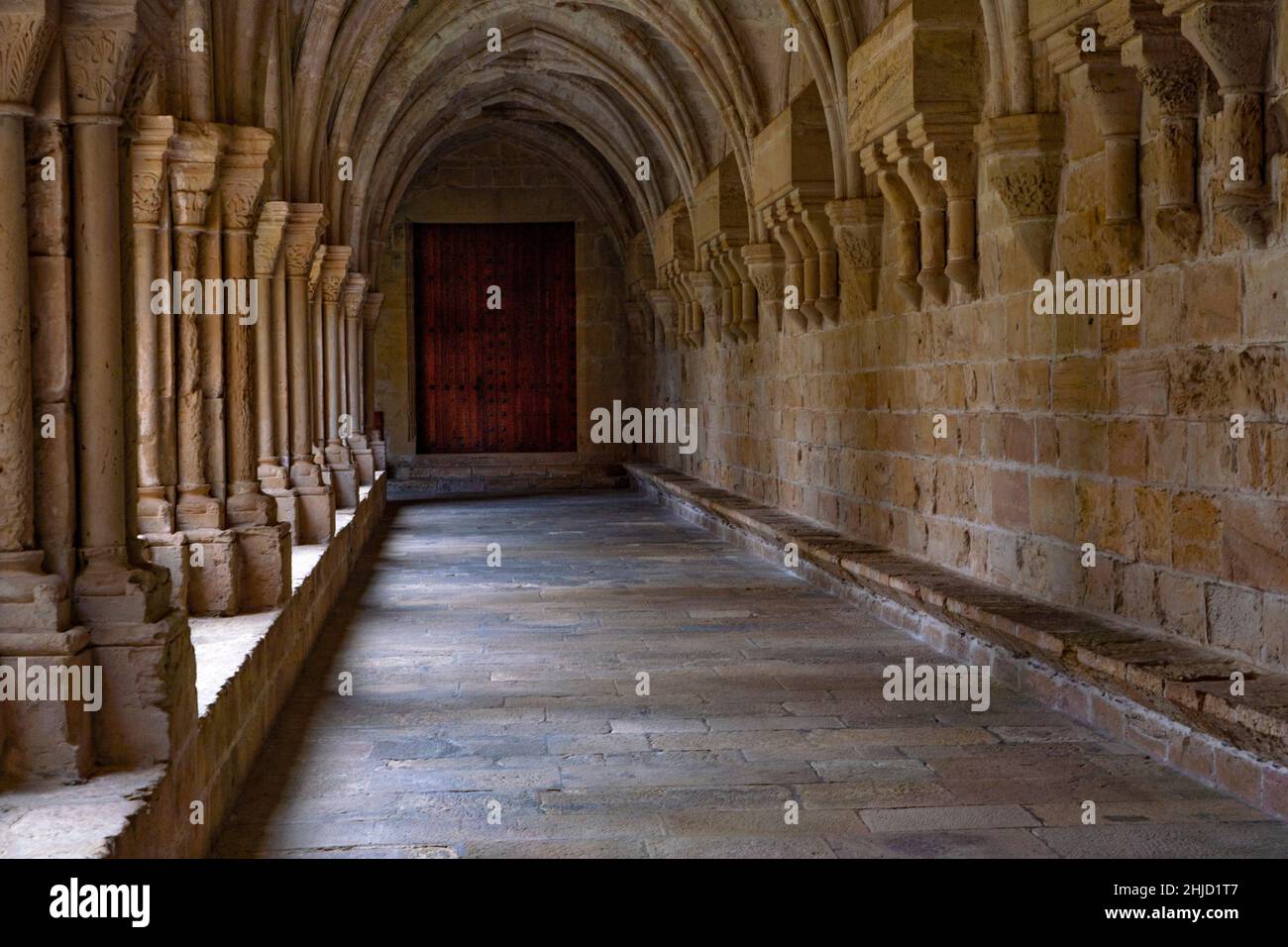 Cloisters of Poblet Abbey,  Reial Monestir de Santa Maria de Poblet, Catalonia, Spain. It is a Cistercian monastery, founded in 1151, located at the f Stock Photo