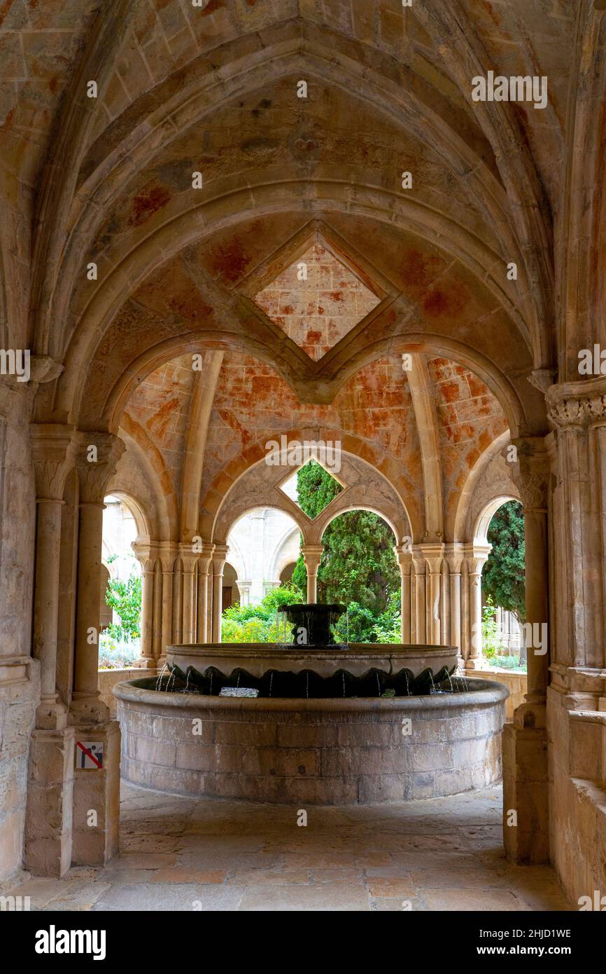 Fountain of ablution, templet del lavatori, Poblet Abbey,  Reial Monestir de Santa Maria de Poblet, Catalonia, Spain. It is a Cistercian monastery, fo Stock Photo