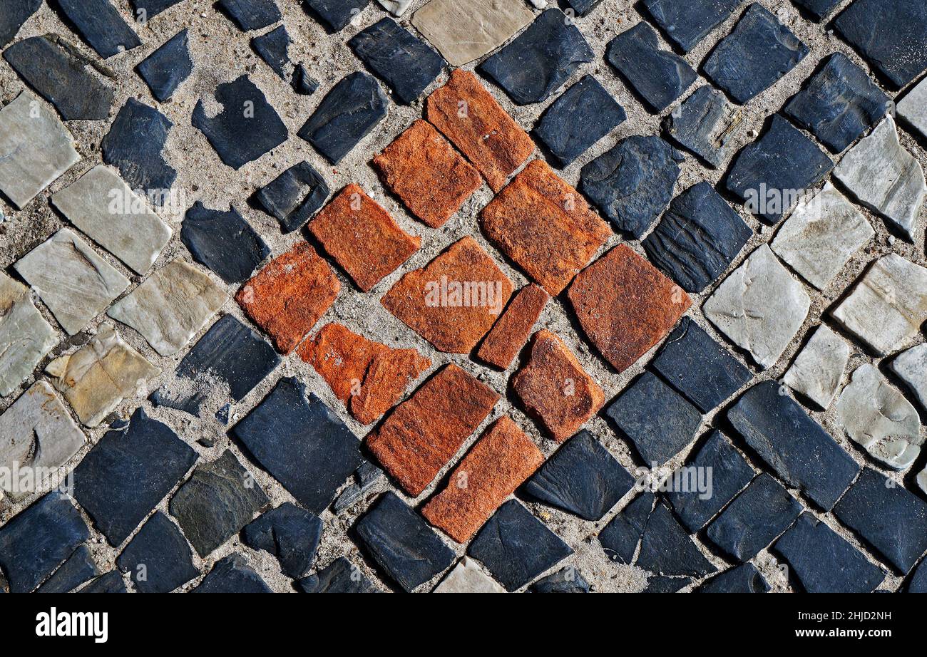 Red, black and white mosaic, sidewalk in Rio Stock Photo