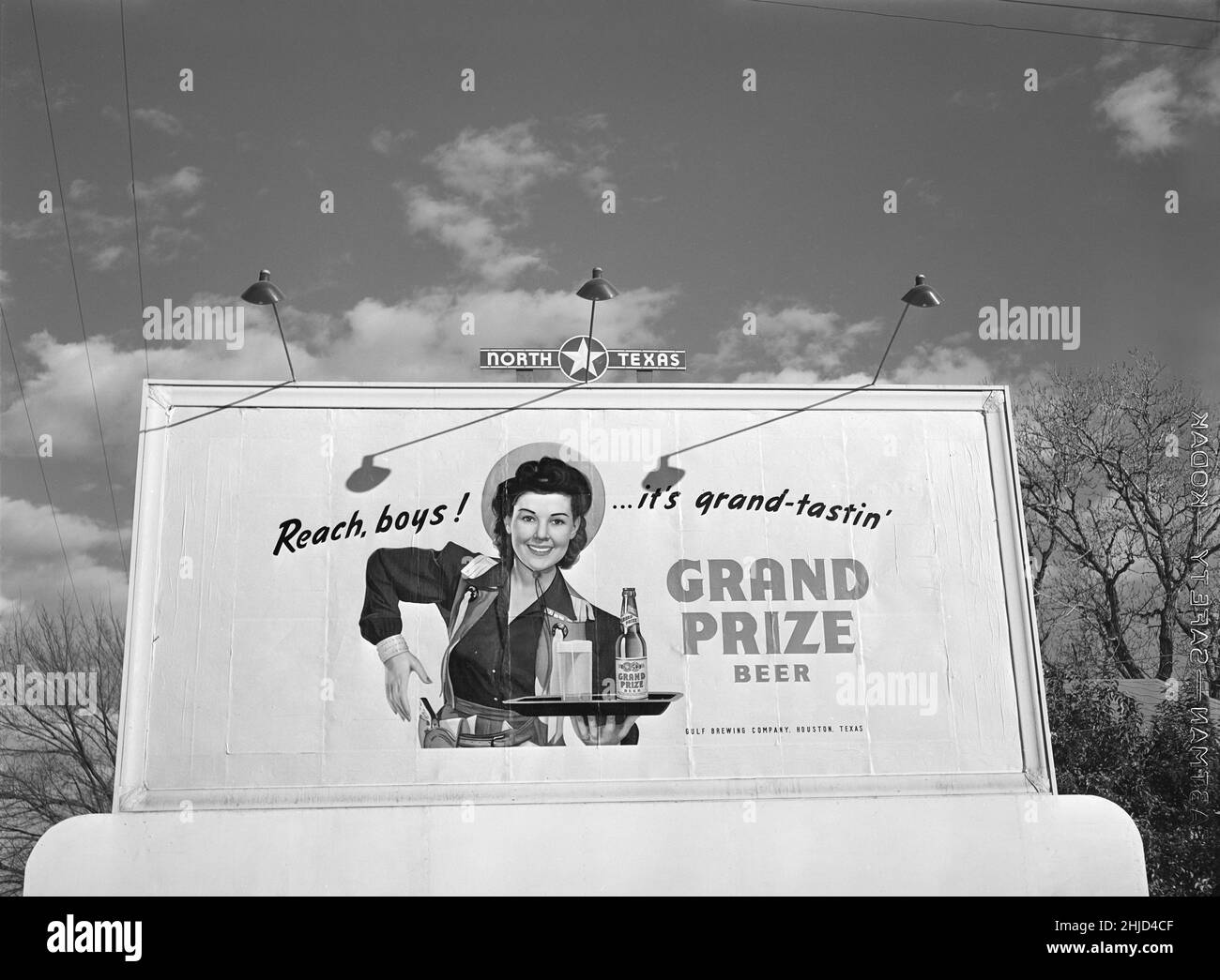 Billboard for Grand Prize Beer, Highway 80 between Fort Worth and Dallas, Texas, USA, Arthur Rothstein, U.S. Office of War Information/U.S. Farm Security Administration, January 1942 Stock Photo