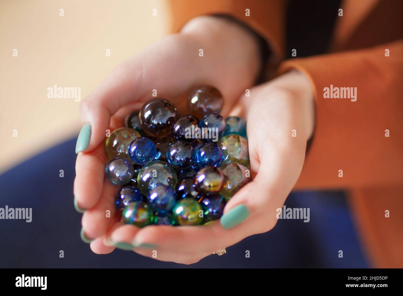 glass balls in hand Stock Photo Alamy