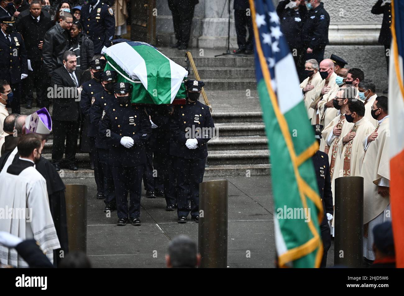 New York, USA. 28th Jan, 2022. The flag covered casket of fallen New