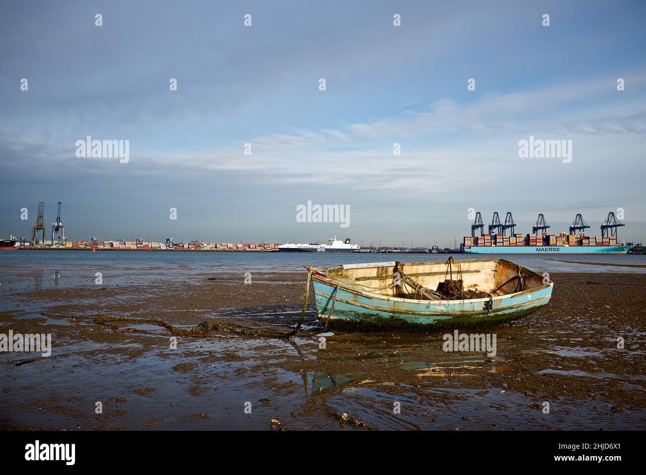 Low tide at Harwich beach looking out to the Port of Felixstowe Stock