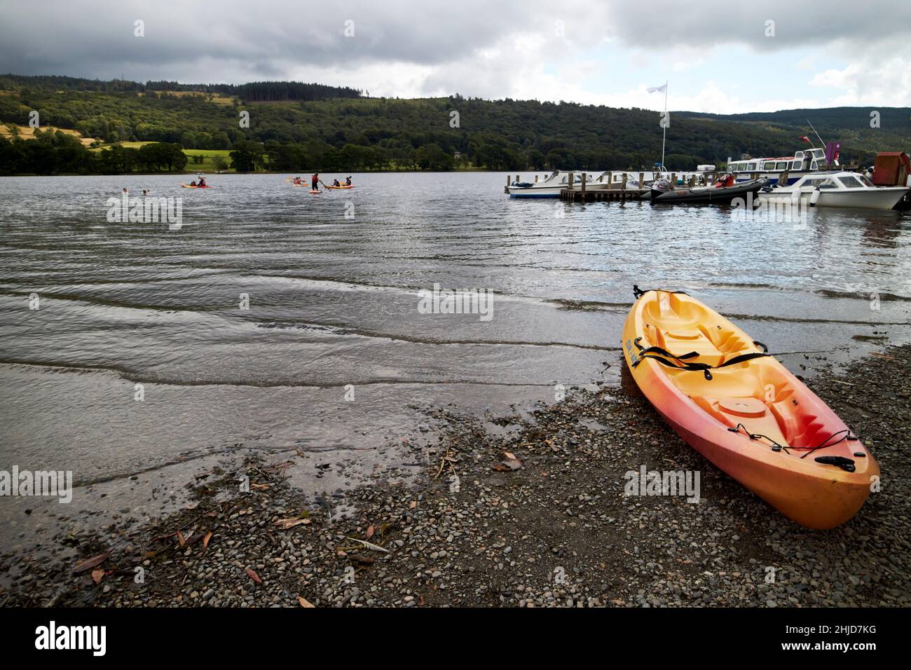 empty sit on top double kayak on the beach at coniston water coniston lake district, cumbria, england, uk Stock Photo