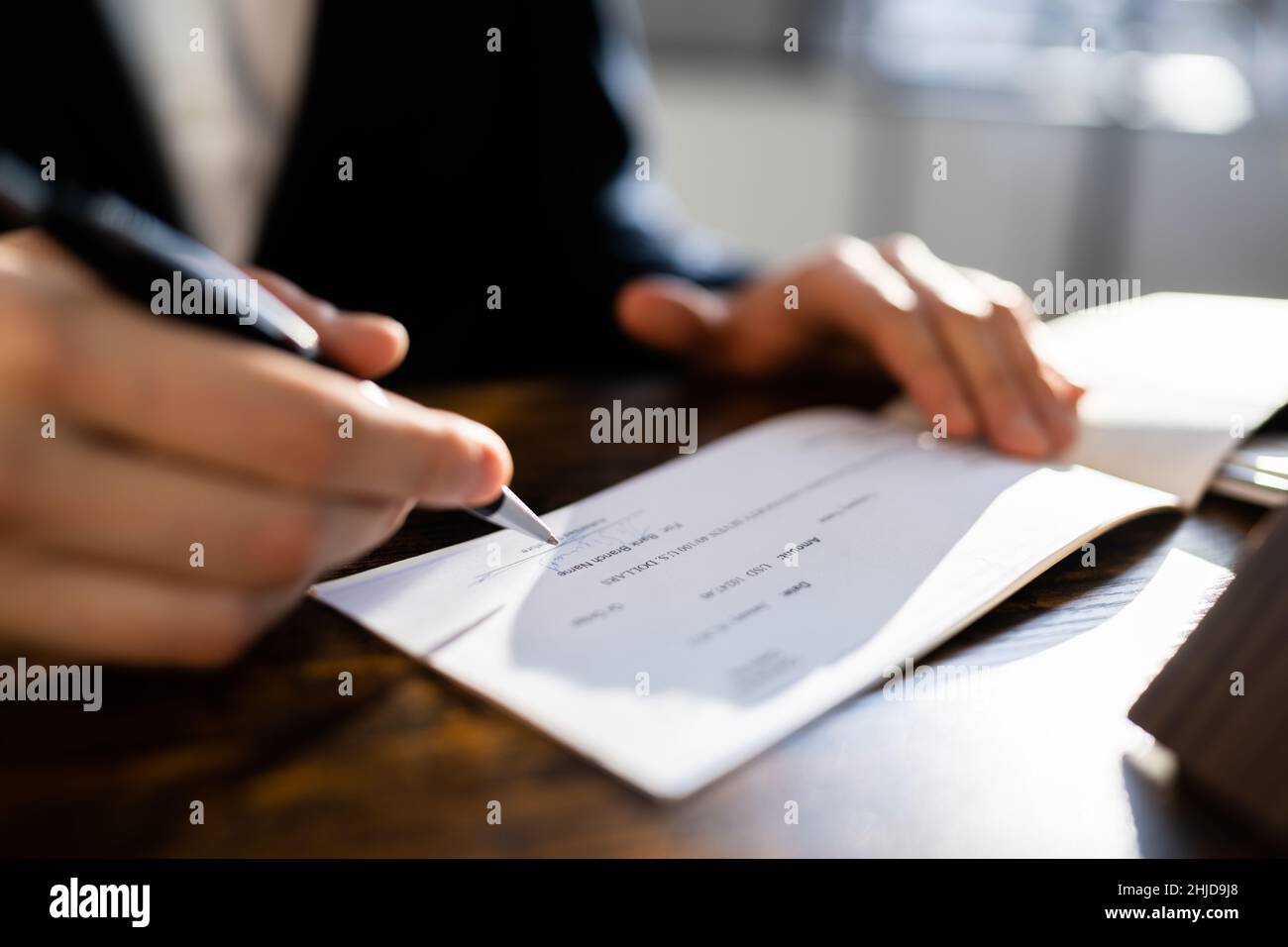 Writing Money Cheque. Sign Check Or Paycheck Stock Photo Alamy
