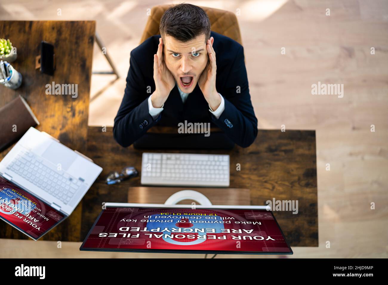 Ransomware Malware Cyber Attack On Business Computer Stock Photo