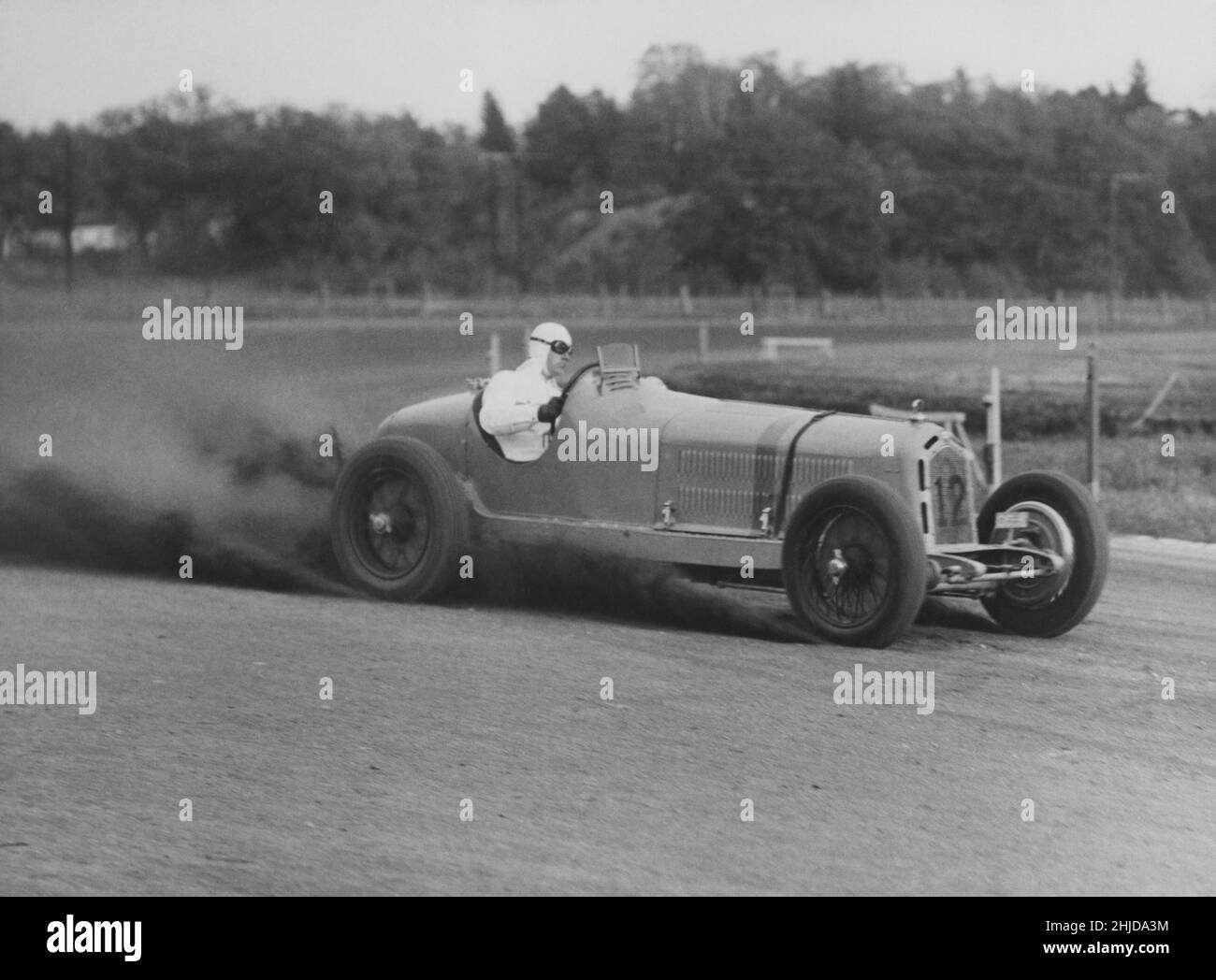 Racing car of the 1930s. The swedish racingdriver in his Alfa Romeo Monza is seen taking the curve in full speed during the international racing event at Solvalla in Stockholm on october 15 1935. Stock Photo
