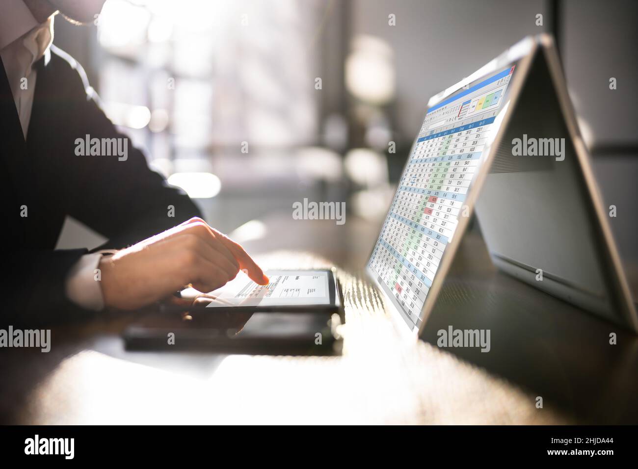 Man Analyzing Digital E Invoice Using Online Software Stock Photo