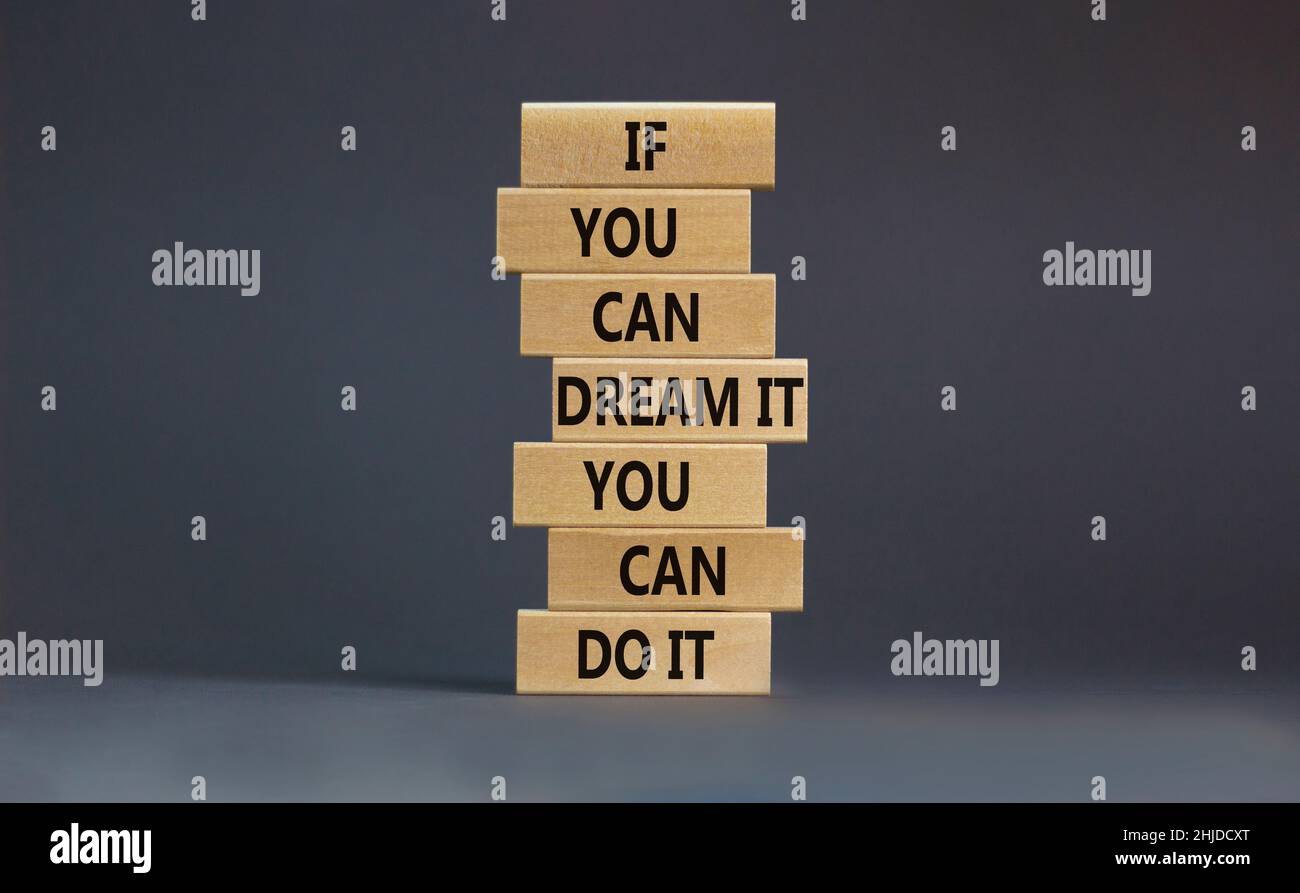 Dream and do it symbol. Wooden blocks with words If you can dream it ...