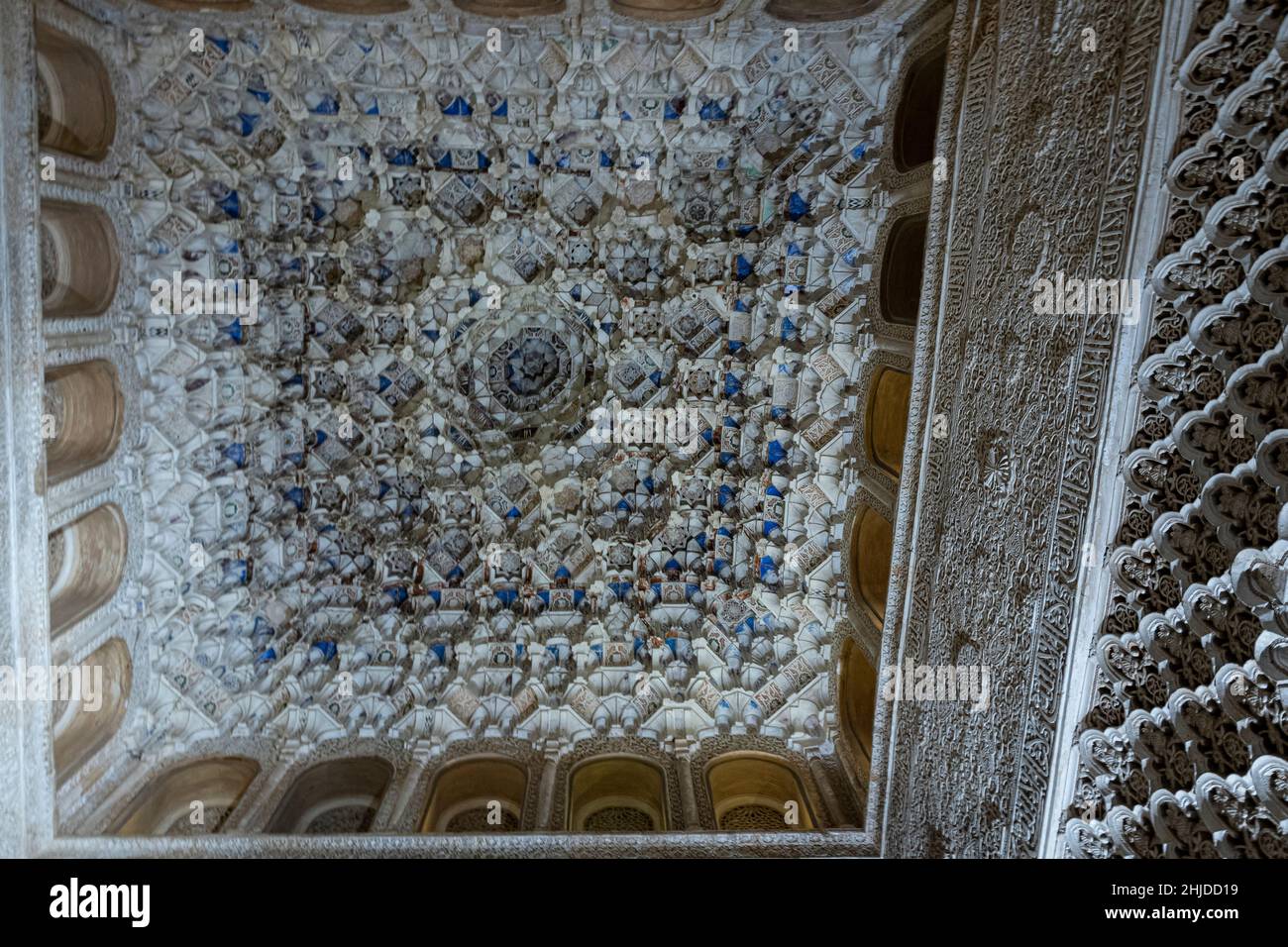 Detail of decoration of the ceiling of the palaces of the Alhambra with the few original colors that remain. Grenade. Andalusia. Spain. Stock Photo
