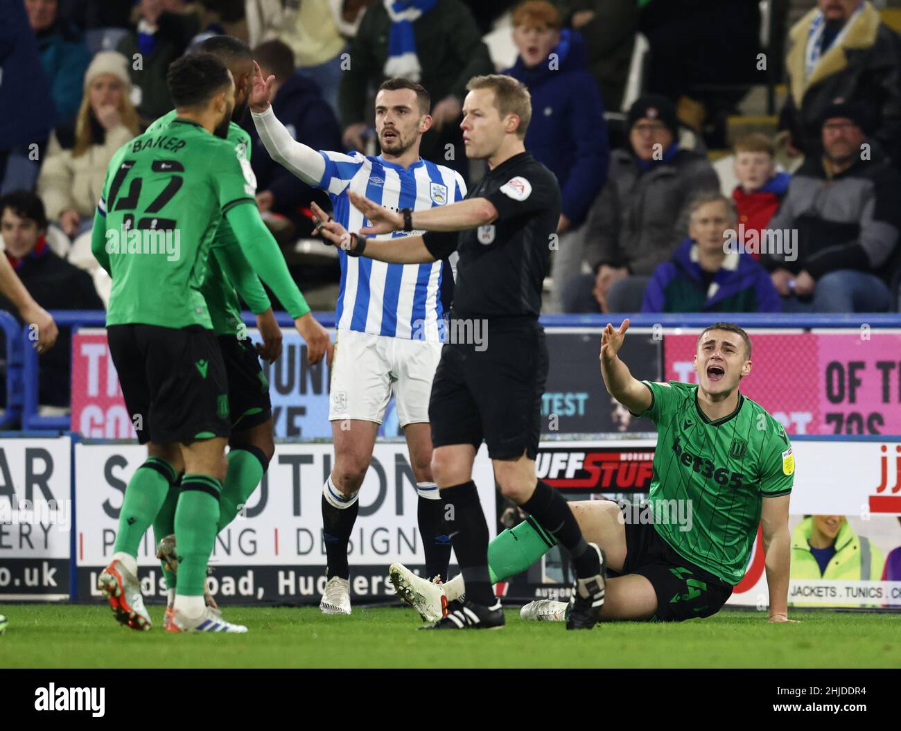 Huddersfield, England, 28th January 2022.   Taylor Harwood-Bellis of Stoke City yells out after a horror tackle by Josh Koroma of Huddersfield Town  during the Sky Bet Championship match at the John Smith's Stadium, Huddersfield. Picture credit should read: Darren Staples / Sportimage Credit: Sportimage/Alamy Live News Stock Photo