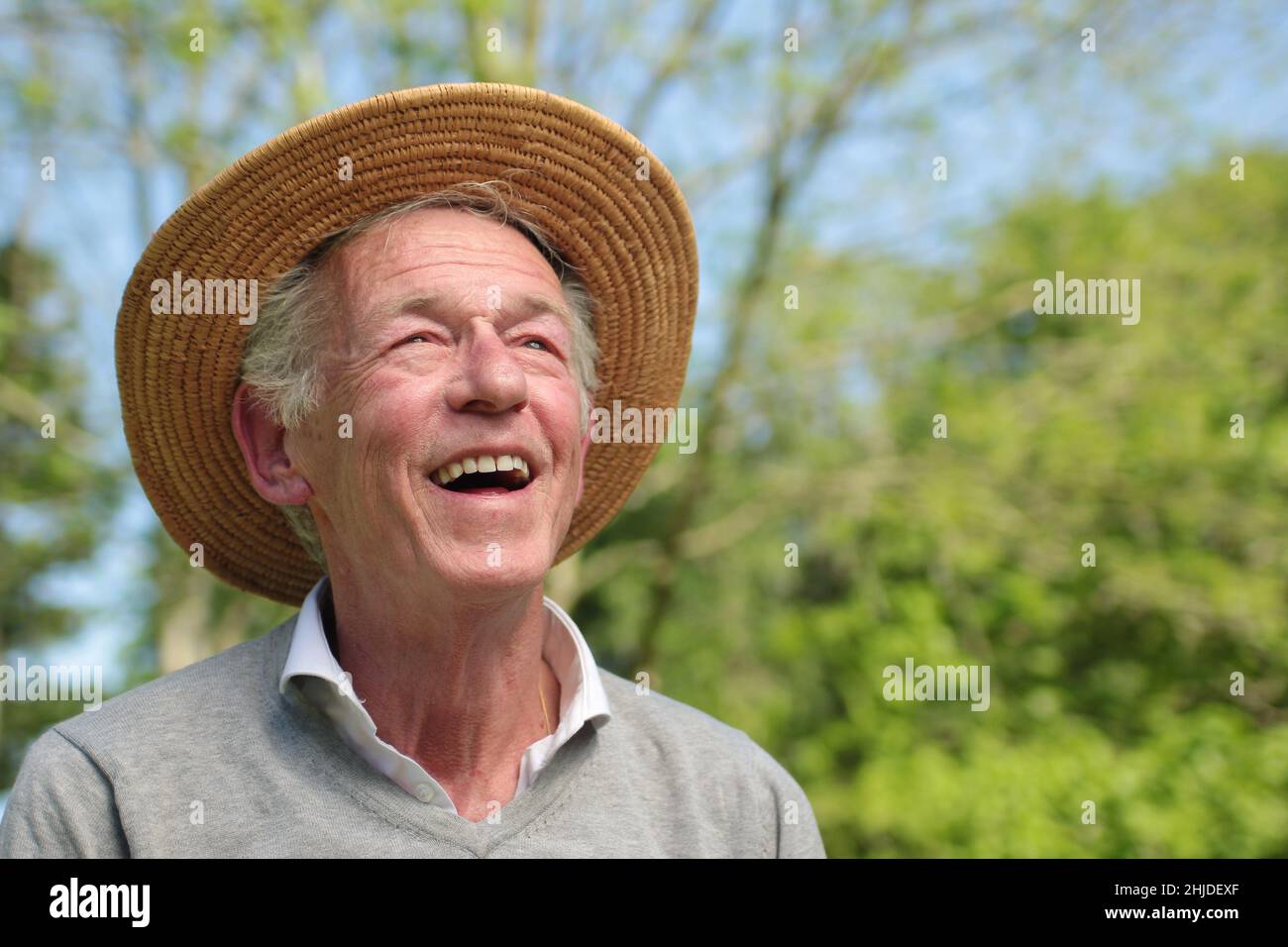 Beautiful old man outside Stock Photo