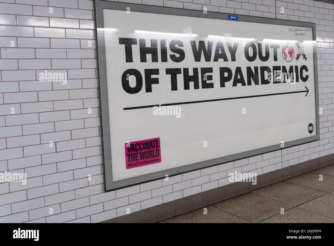 huge poster on the billboard showing 'This way out of the pandemic', England UK self Isolation rules  ending soon Stock Photo