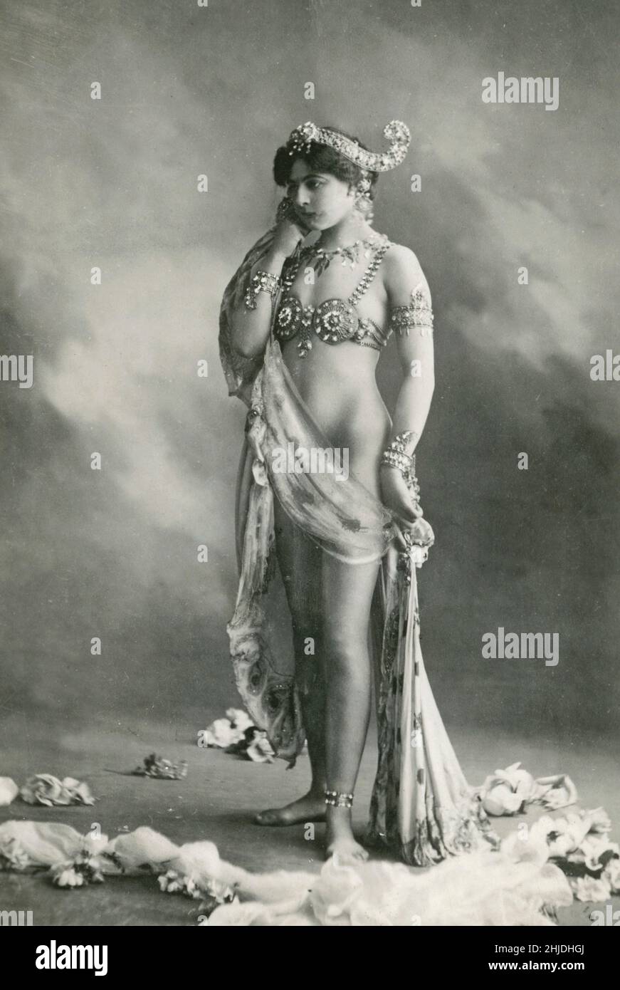 Mata Hari. Margaretha Geertruida MacLeod (née Zelle; 7 August 1876 – 15 October 1917), better known by the stage name Mata Hari (/'m??t? 'h??ri/), was a Dutch exotic dancer and courtesan who was convicted of being a spy for Germany during World War I. Professor Shipman, a noted scholar stated 'he believed she was innocent  and condemned only because the French Army needed a scapegoat. She was executed by firing squad in France. 1906 Stock Photo