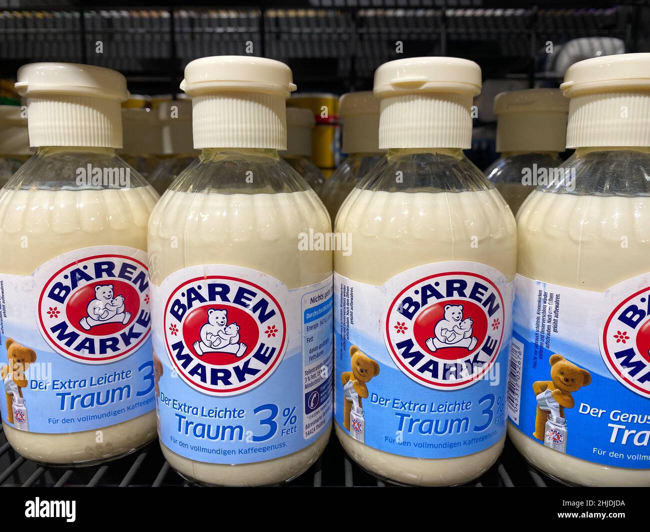 RHEINBACH, GERMANY 15 February 2021,  Several small bottles of 'Bärenmarke' coffee milk with 3 percent fat on the shelf of a supermarket Stock Photo