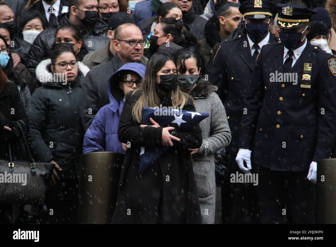 New York, USA. 28th Jan, 2022. Casket of Jason Rivera, killed NYPD officer leaves St Patrick's Cathedral. The Mayor of New York City, Eric Adams and family members and wife participate in the funeral ceremony. 22 years old Jason and his partner, 27 years old Wilbert Mora responded to a domestic violence call and were shot by a 47-year-old suspect, Lashawn McNeil, on Friday (21) night in Harlem. Jason died on the same day while Wilbert died 4 days later in the hospital. Roads on 5th avenue from 57 street onward are closed to vehicles. Credit: ZUMA Press, Inc./Alamy Live News Stock Photo